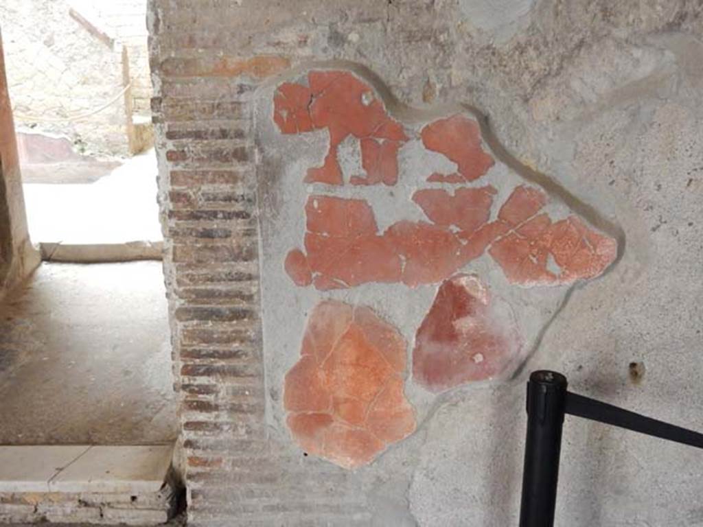 V.8 Herculaneum. May 2018. Room 1, east wall in south-east corner, with small corridor (on left).
Photo courtesy of Buzz Ferebee.